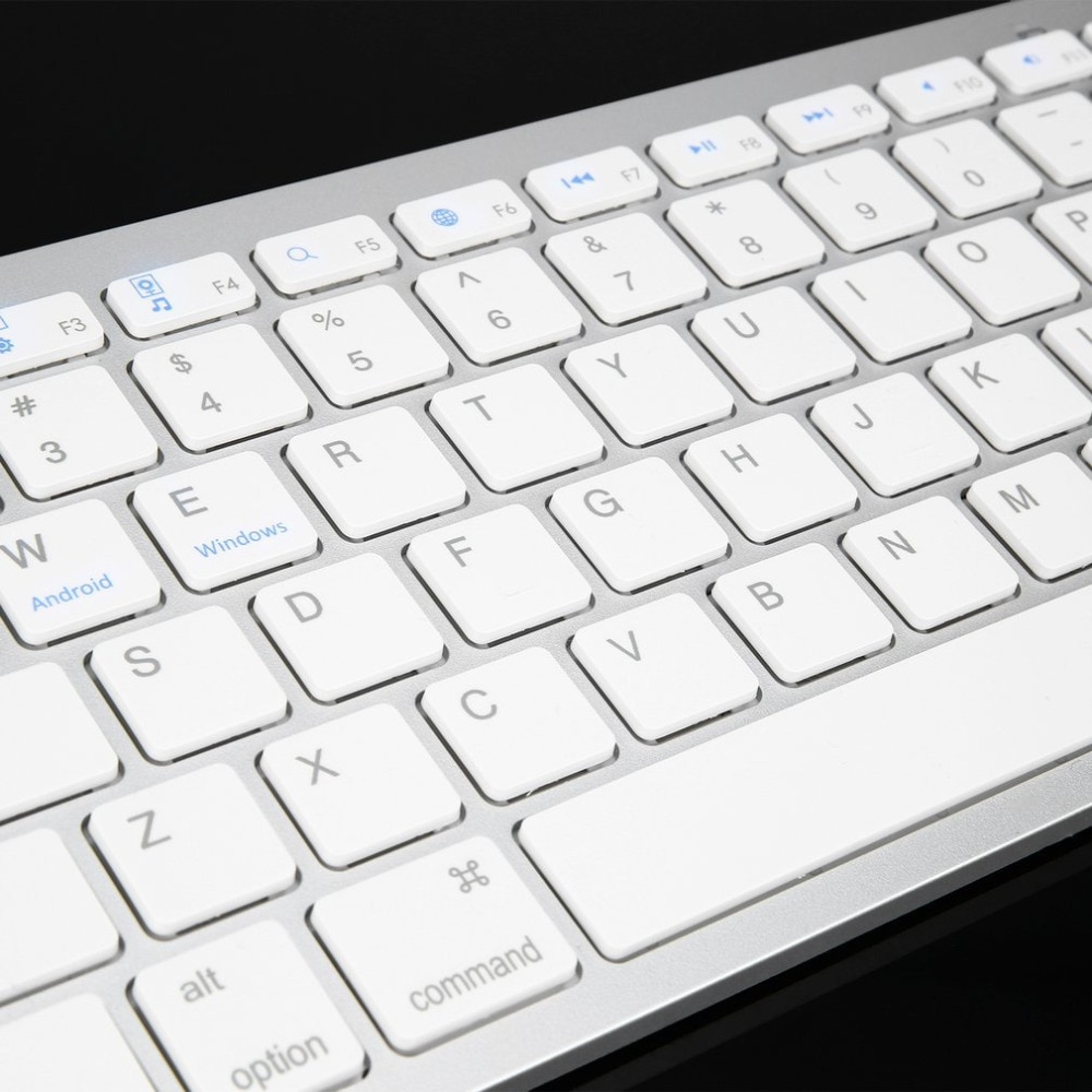 S847842fb9e8b4450bb6e3d20c31afc05I Ultra-slim 78 Keys Wireless Keyboard For iPad Macbook PC